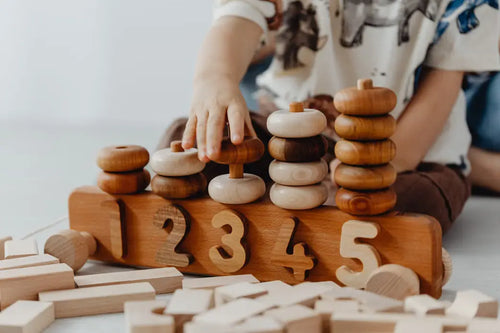Wooden learning toys arranged for play